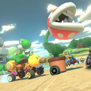 Mario Kart 8 kurvailee trailereilla ja sateenkaaritien kuvilla